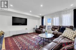 Living room featuring hardwood / wood-style floors - 