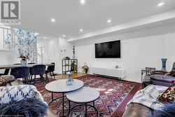 Living room featuring wood-type flooring - 