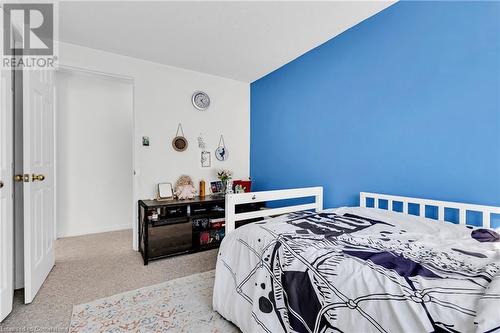 Bedroom with light carpet - 50 Howe Drive Unit# 17B, Kitchener, ON - Indoor Photo Showing Bedroom