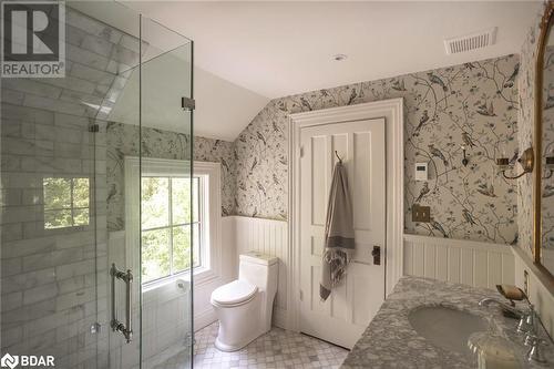 Bathroom featuring vanity, tile patterned floors, toilet, and vaulted ceiling - 42 Burton Avenue, Barrie, ON - Indoor Photo Showing Bathroom