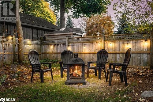 View of patio terrace at dusk - 42 Burton Avenue, Barrie, ON - Outdoor