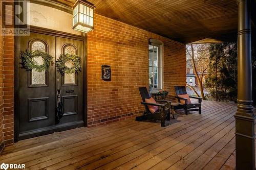 Wooden deck with a porch - 42 Burton Avenue, Barrie, ON - Outdoor With Deck Patio Veranda With Exterior