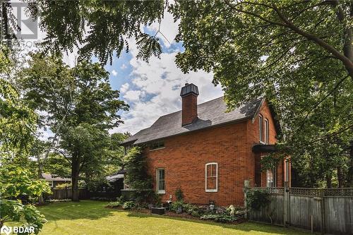 View of side of property with a lawn - 42 Burton Avenue, Barrie, ON - Outdoor