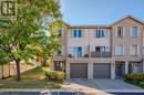 Multi unit property featuring a garage - 230 Blackhorne Drive Unit# 19, Kitchener, ON  - Outdoor With Facade 