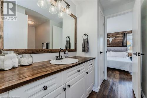 Bathroom featuring hardwood / wood-style floors and vanity - 230 Blackhorne Drive Unit# 19, Kitchener, ON - Indoor Photo Showing Bathroom