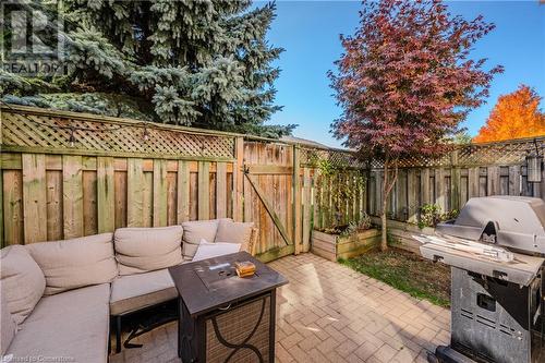 View of patio featuring area for grilling and an outdoor hangout area - 230 Blackhorne Drive Unit# 19, Kitchener, ON - Outdoor With Deck Patio Veranda