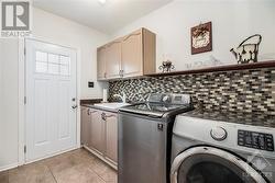 Mudroom with laundry, garage access, side door access - 