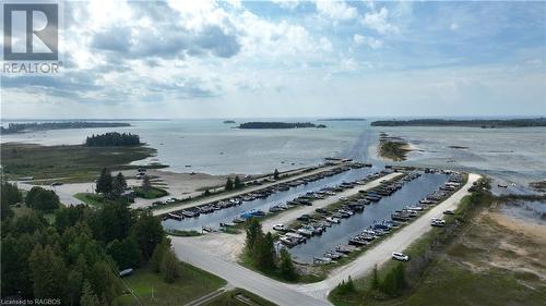 Oliphant Beach and Marina - 31 Montrose Street, South Bruce Peninsula, ON - Outdoor With Body Of Water With View