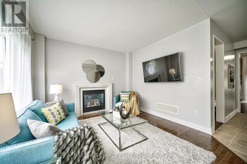 3315 Ruth Fertel Drive, Mississauga, ON - Indoor Photo Showing Living Room With Fireplace