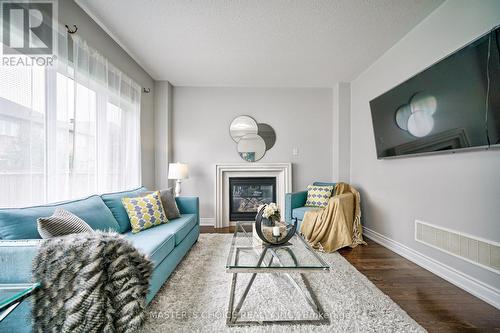 3315 Ruth Fertel Drive, Mississauga, ON - Indoor Photo Showing Living Room With Fireplace