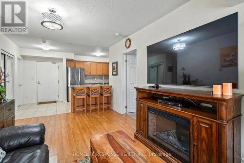 124 - 10 Mendelssohn Street, Toronto, ON - Indoor Photo Showing Other Room With Fireplace