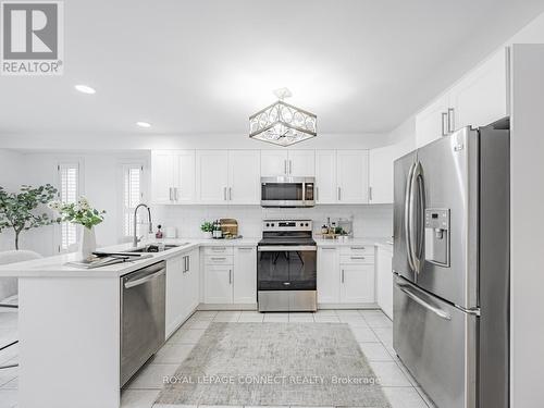 203 Fallingbrook Street, Whitby, ON - Indoor Photo Showing Kitchen With Upgraded Kitchen