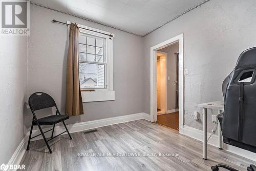 Living area with light hardwood / wood-style floors - 77 Province Street N, Hamilton, ON - Indoor Photo Showing Other Room