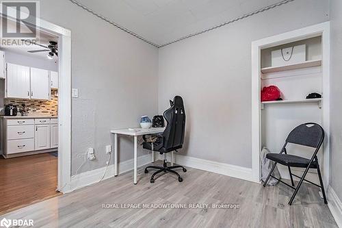 Office space with light wood-type flooring and ceiling fan - 77 Province Street N, Hamilton, ON - Indoor