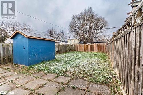 View of yard featuring a storage unit - 77 Province Street N, Hamilton, ON - Outdoor