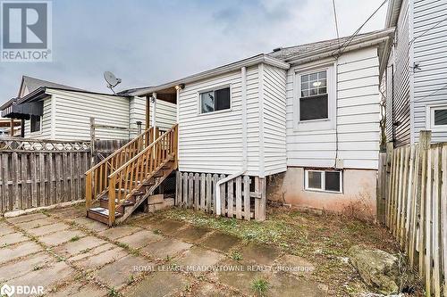 Rear view of property featuring a patio area - 77 Province Street N, Hamilton, ON - Outdoor With Exterior