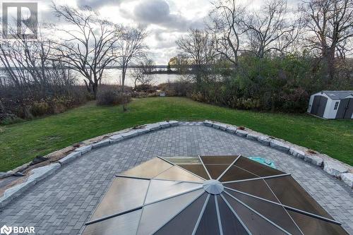 View of swimming pool with a water view and a yard - 1647 Lakeside Drive, Hillier, ON - Outdoor