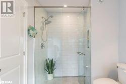 Bathroom featuring toilet and walk in shower - 