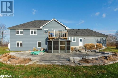 Rear view of house with a balcony and a patio area - 1647 Lakeside Drive, Hillier, ON - Outdoor