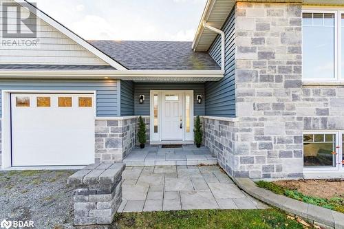 Property entrance featuring a garage - 1647 Lakeside Drive, Hillier, ON - Outdoor