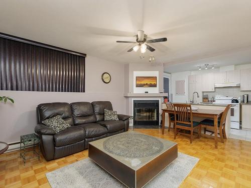 Salon - 1035A Rue Melatti, Montréal (Lasalle), QC - Indoor Photo Showing Living Room With Fireplace