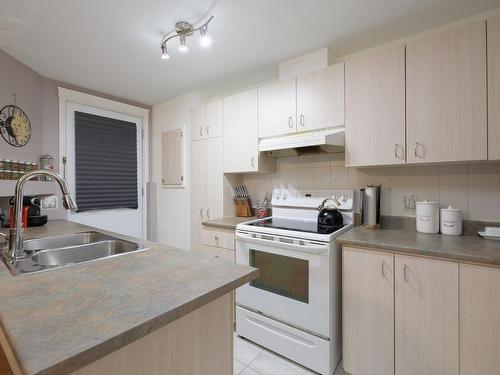 Kitchen - 1035A Rue Melatti, Montréal (Lasalle), QC - Indoor Photo Showing Kitchen With Double Sink