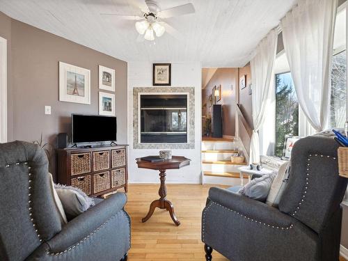 Boudoir - 54 Ch. Des Pruches, L'Ange-Gardien, QC - Indoor Photo Showing Living Room With Fireplace