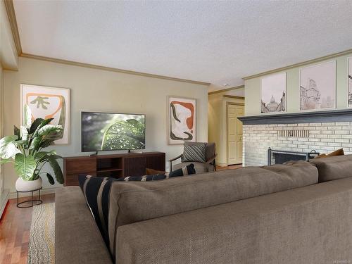 203-420 Linden Ave, Victoria, BC - Indoor Photo Showing Living Room With Fireplace