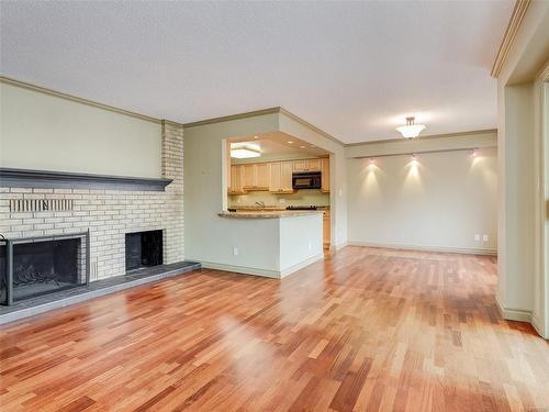 203-420 Linden Ave, Victoria, BC - Indoor Photo Showing Living Room With Fireplace