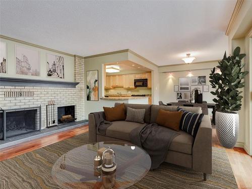 203-420 Linden Ave, Victoria, BC - Indoor Photo Showing Living Room With Fireplace