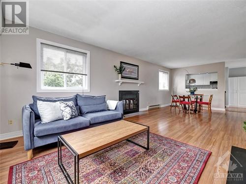 39 Castlegreen Private, Ottawa, ON - Indoor Photo Showing Living Room With Fireplace