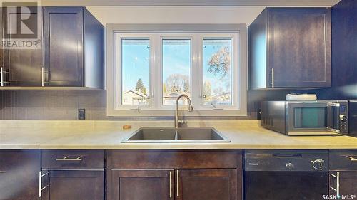 939 Brown Street, Moose Jaw, SK - Indoor Photo Showing Kitchen With Double Sink