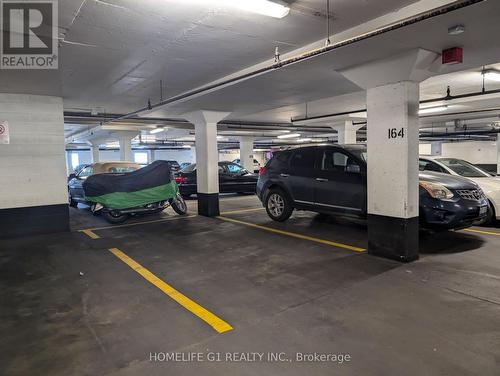 Ph-103 - 38 Lee Centre Drive, Toronto, ON - Indoor Photo Showing Garage