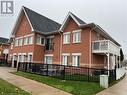 View of side of property with a lawn and a balcony - 1701 Lampman Avenue Unit# 601, Burlington, ON  - Outdoor 