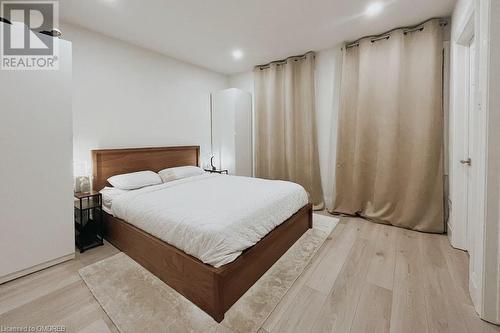 Bedroom with light hardwood / wood-style floors - 1701 Lampman Avenue Unit# 601, Burlington, ON - Indoor Photo Showing Bedroom