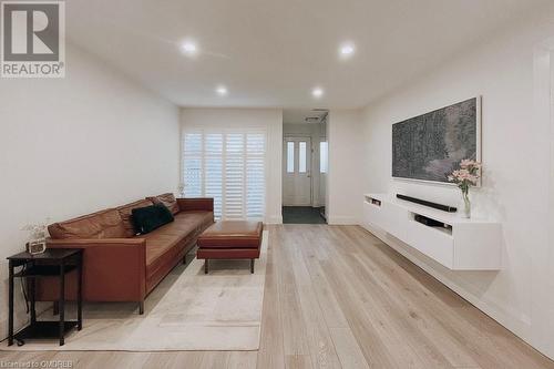 Living room featuring light vinyl floors - 1701 Lampman Avenue Unit# 601, Burlington, ON - Indoor