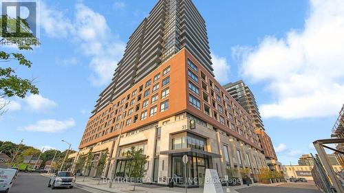 613 - 33 Frederick Todd Way, Toronto, ON - Outdoor With Facade