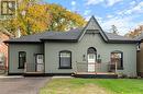 View of front of house featuring a front yard - 50 Ontario Street, Brantford, ON  - Outdoor With Deck Patio Veranda 