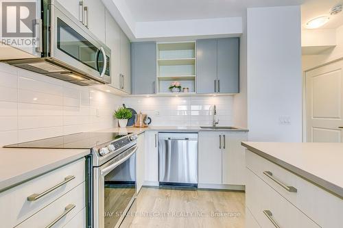 206 - 4699 Glen Erin Drive, Mississauga, ON - Indoor Photo Showing Kitchen With Upgraded Kitchen