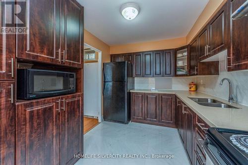 605 - 3555 Derry Road E, Mississauga, ON - Indoor Photo Showing Kitchen With Double Sink