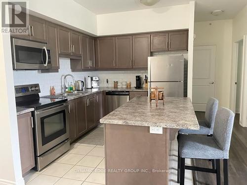 213 - 640 Sauve Street, Milton, ON - Indoor Photo Showing Kitchen With Double Sink