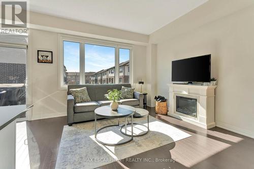 7 Freedom Crescent, Hamilton, ON - Indoor Photo Showing Living Room With Fireplace