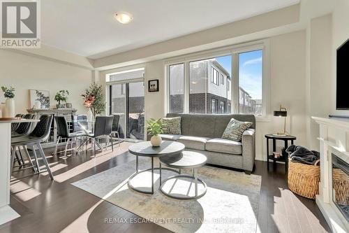 7 Freedom Crescent, Hamilton, ON - Indoor Photo Showing Living Room With Fireplace