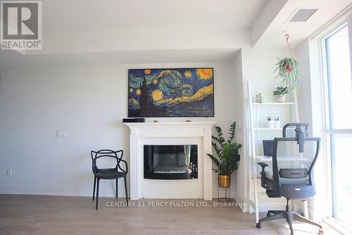 1020 - 2550 Simcoe Street N, Oshawa, ON - Indoor With Fireplace