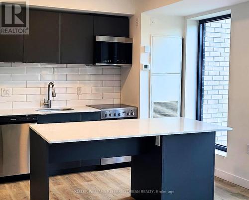 210 - 325 University Avenue W, Cobourg, ON - Indoor Photo Showing Kitchen With Upgraded Kitchen