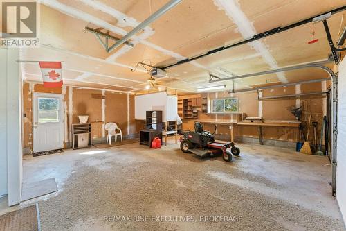 1033 Coupland Road, South Frontenac (Frontenac South), ON - Indoor Photo Showing Garage