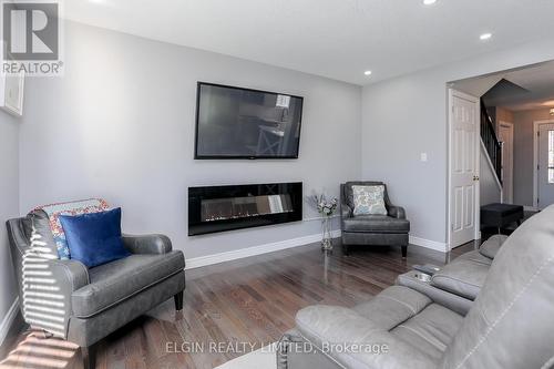 22 Cook Crescent, St. Thomas, ON - Indoor Photo Showing Living Room With Fireplace