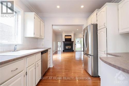 1340 Aurele Street, Ottawa, ON - Indoor Photo Showing Kitchen With Fireplace