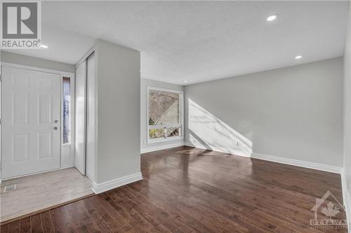 Bright Living Room with Pot lights and Hrdwood floors - 162 Woodfield Drive, Ottawa, ON - Indoor Photo Showing Other Room