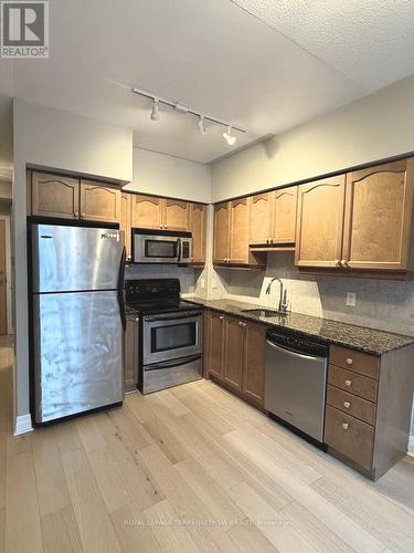 328 - 58 Marine Parade Drive, Toronto, ON - Indoor Photo Showing Kitchen